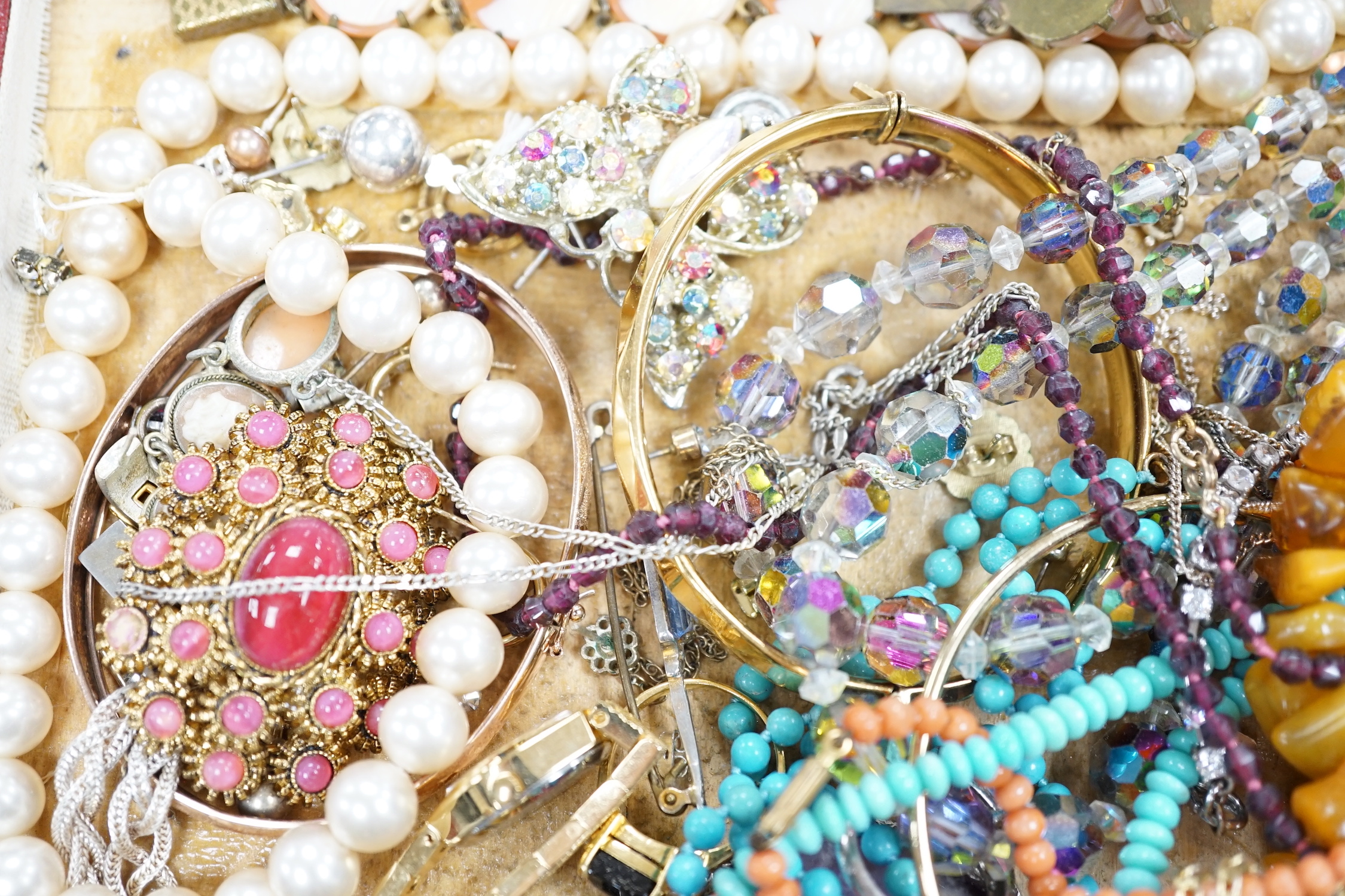 Assorted costume jewellery including amber necklace, coral necklace, cameo shell bracelet etc.